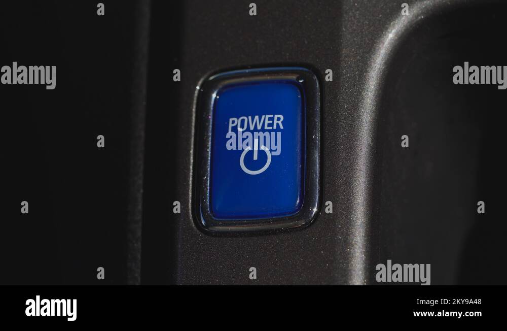 Finger is pushing a power button in electric car Stock Video Footage