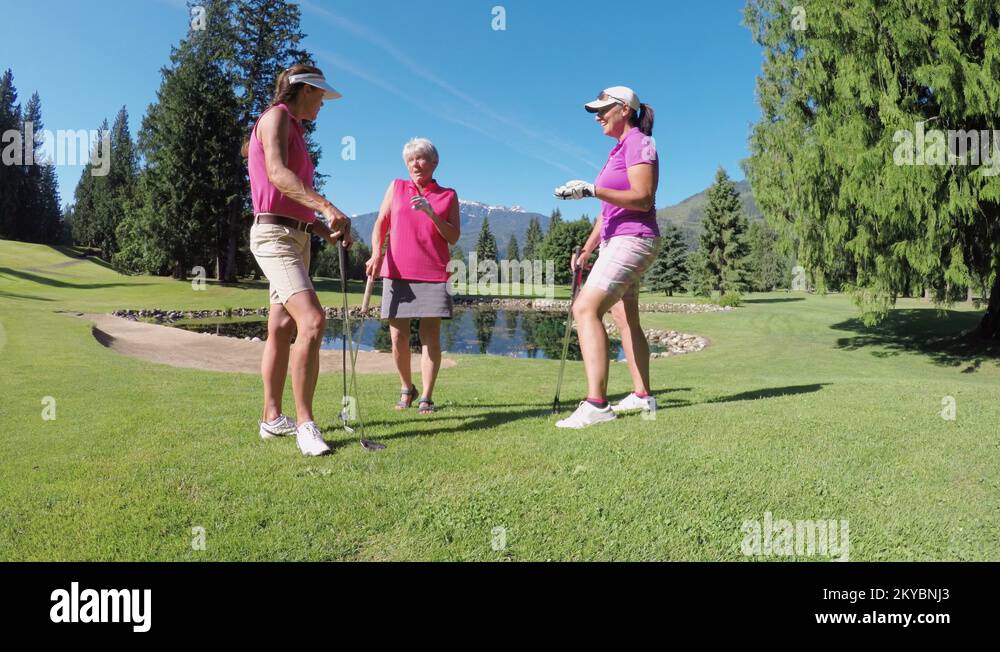 Women with golf club talking in the golf course 4k Stock Video Footage