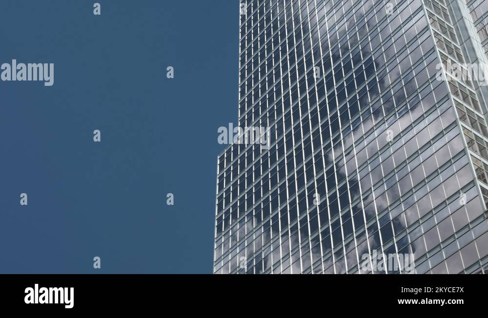 Pan Modern Business Office Building with Clouds Blue Sky Reflection on ...