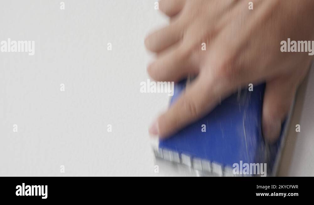 Correction of wall texture before priming and painting 4K video Stock