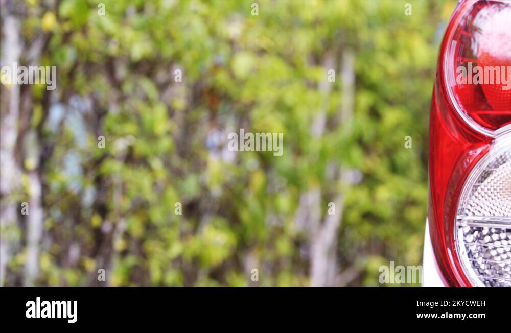 Back light of the car, blinking turn. Closeup, sliding view Stock Video