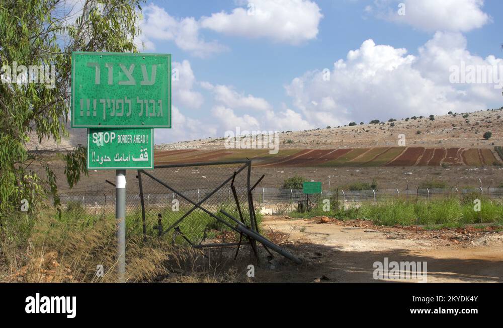 Israeli Border Sign a warning Sign: Stop! border ahead a border between Lebanon and Israel ...