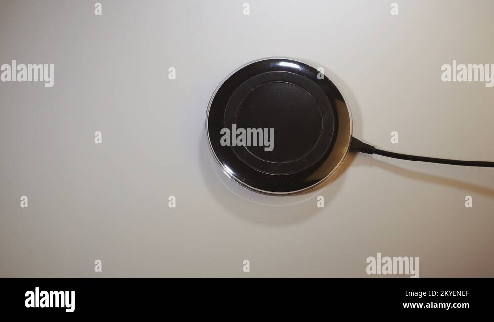 Wired vs wireless mobile phone charging with green screen locked and