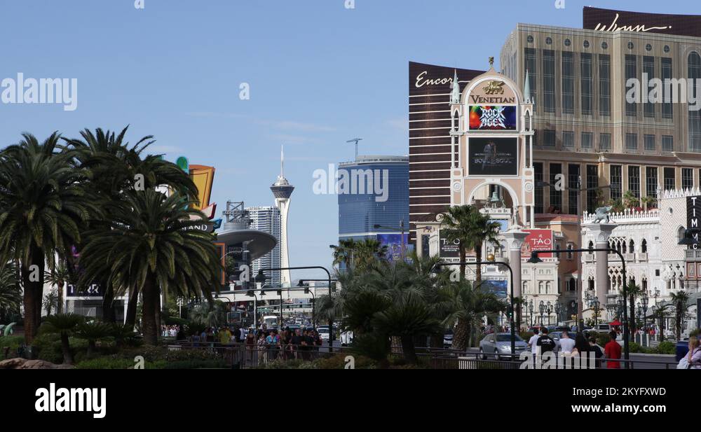 Tourists People Visit Famous Landmarks and Cars Traffic Jam on Las Vegas Strip Stock Video