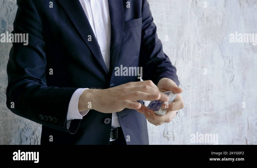 Magician's hands performing card trick. Throwing, catching cards in the