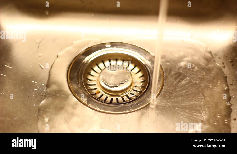 Water flows into the sink Stock Video Footage Alamy