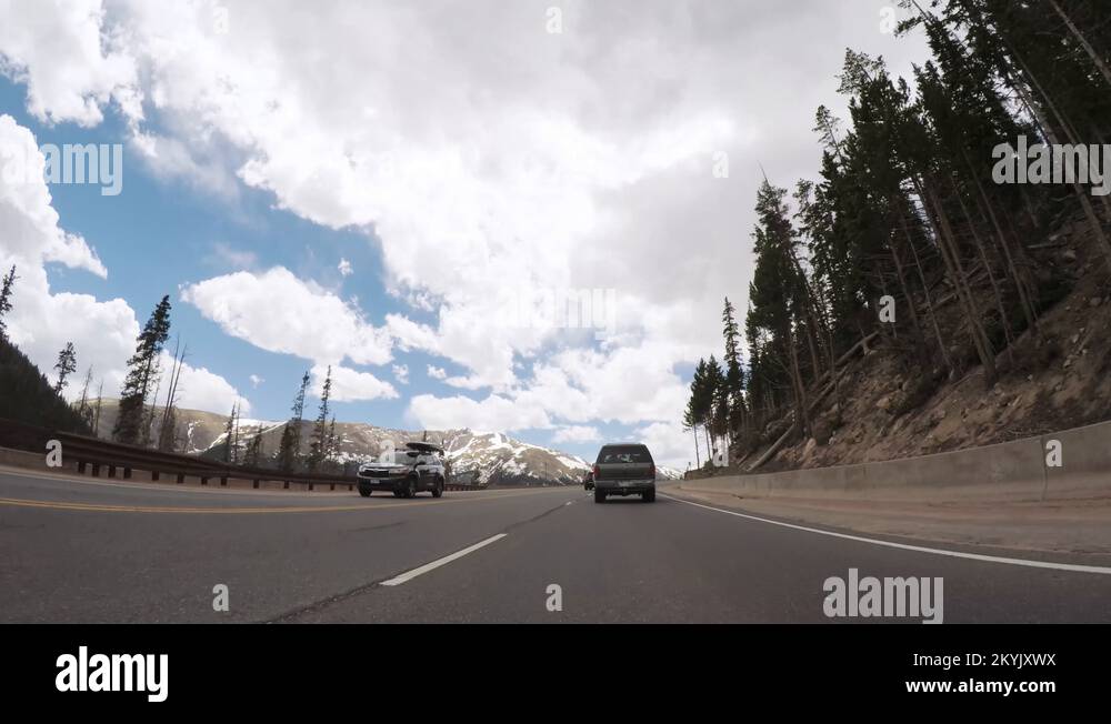 Driving on mountain highway 40 over Berthoud Pass in the Summer Stock