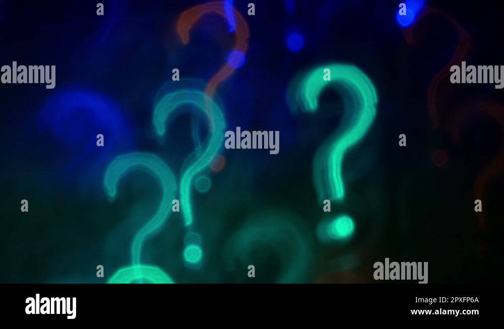 Question marks. Out of focus lights background. 4K UHD 2160p footage