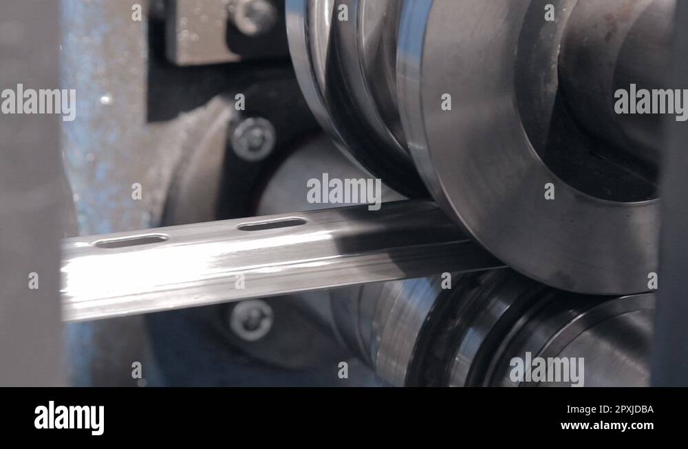 a machine bends perforated metal tape 5 Stock Video Footage Alamy