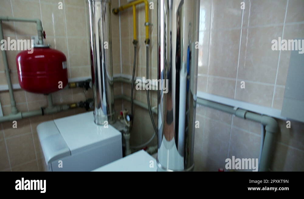 Boilerhouse at home. Heating system. Gas boilers in boiler room. Metal