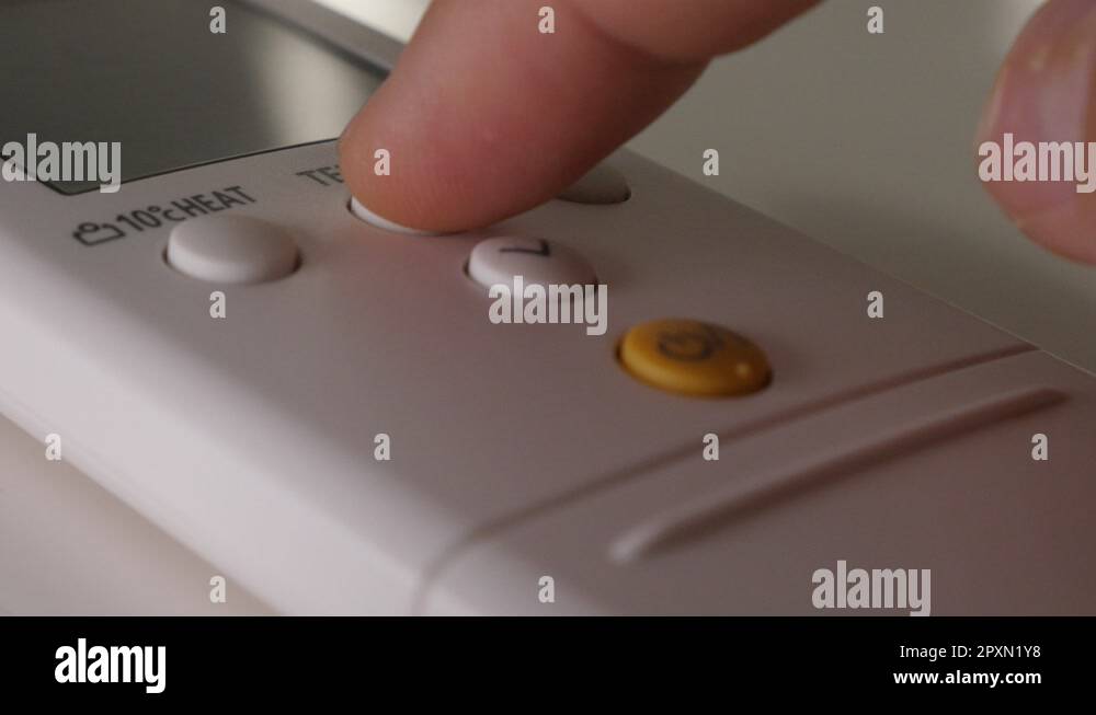 Room temperature lowering on air conditioner remote buttons 4K