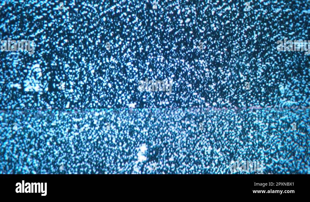 A flickering, analog TV signal. VHS retro recording video cassettes, TV