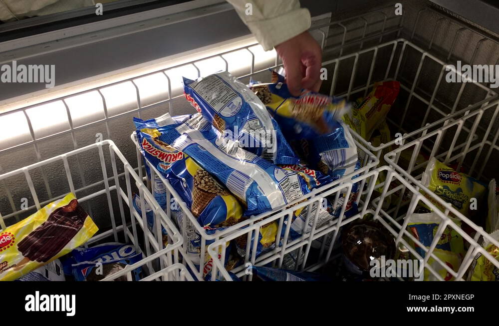Woman buying ice cream inside 7 eleven convenience stores with 4k