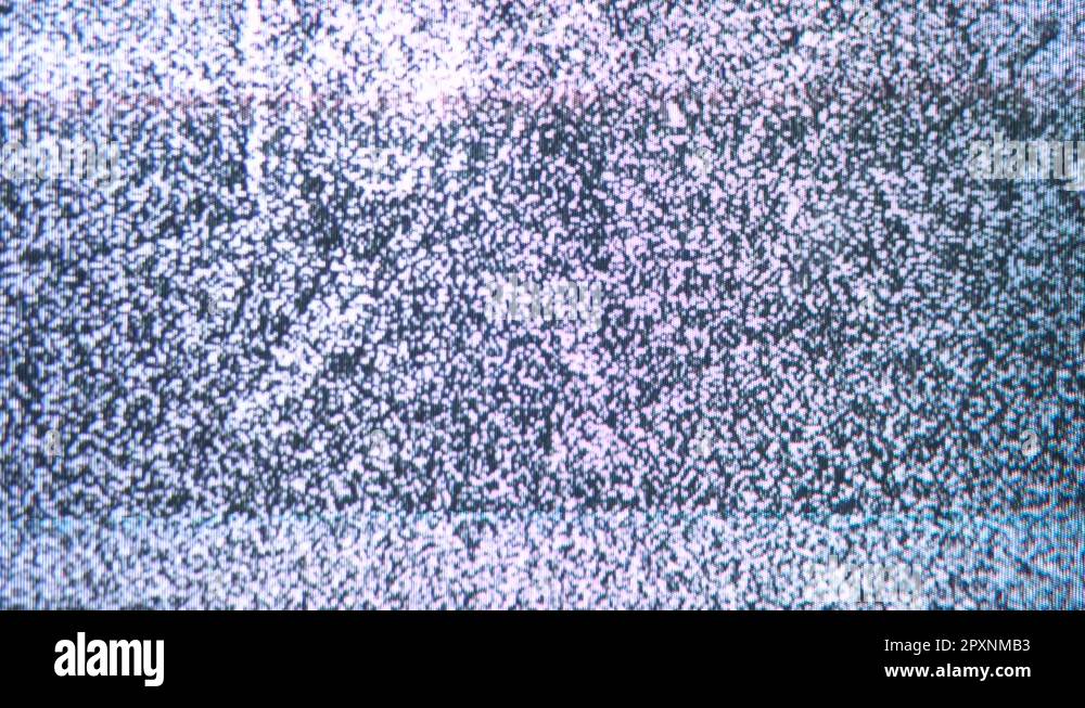 A flickering, analog TV signal. VHS retro recording video cassettes, TV