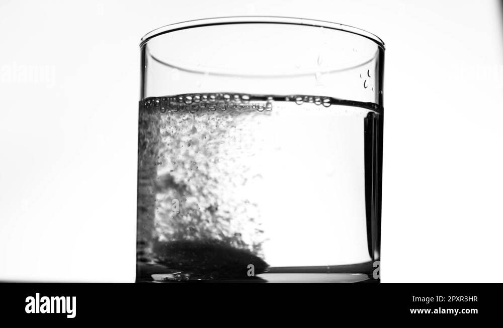 Effervescent Antacid Tablet in Glass of Water Stock Video Footage Alamy