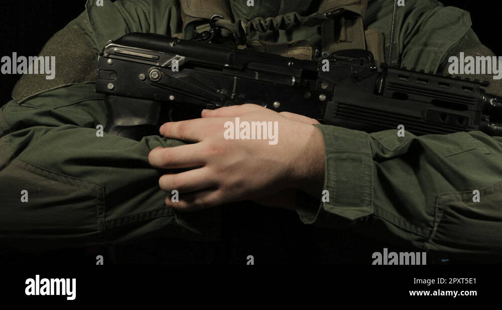 Soldier holding AK-47 assault rifle Stock Video Footage - Alamy