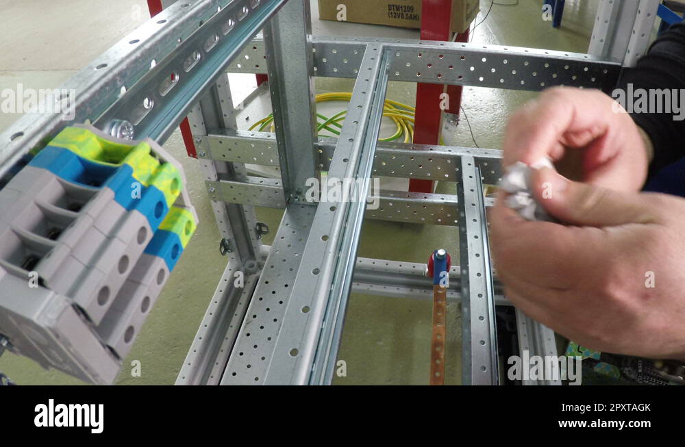 The assembling of electric fuses in fuse box. No face. Closeup. 4K