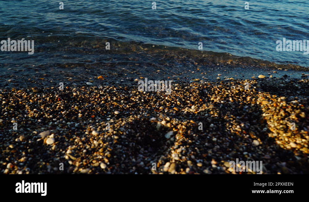 Woman feet with flip flops on beach shore Stock Video Footage - Alamy