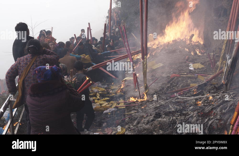 Chinese people pray for good luck and healthy and wealth under cliff