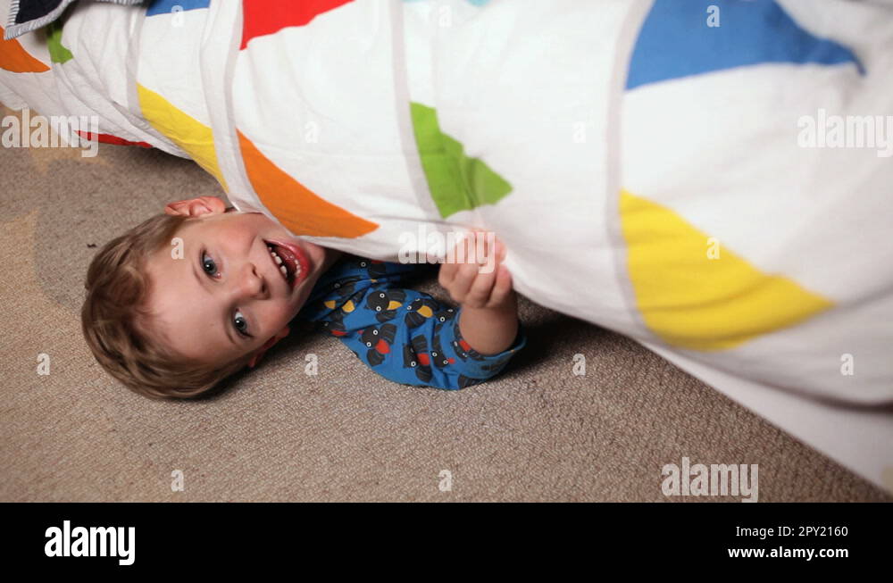 Boy hiding under bed Stock Videos & Footage - HD and 4K Video Clips - Alamy