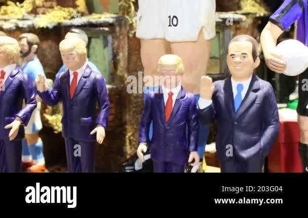 Picture of Naples, Italy - December 24, 2021: Hand-painted terracotta figurines ...