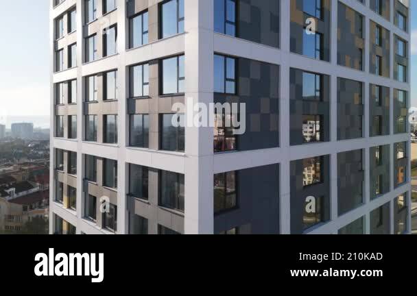 A newly constructed residential building features a sleek design with ...