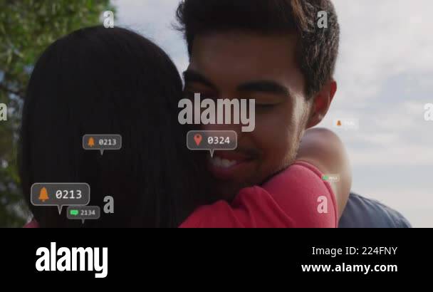 Hugging couple with location and notification icons animation over ...