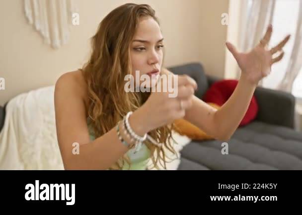 Fury unleashed, beautiful young hispanic woman, choking with rage ...