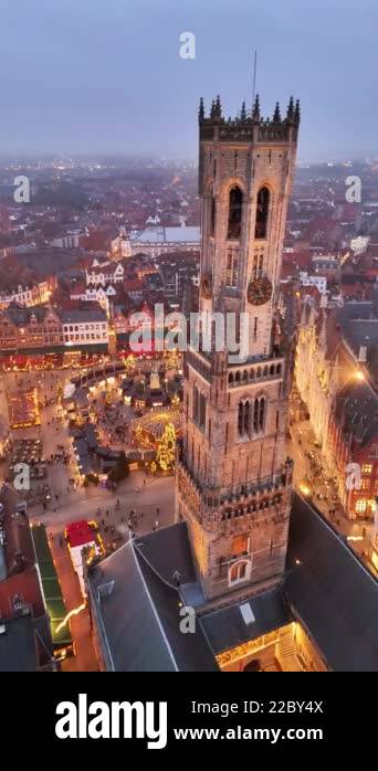 Wander through the enchanting Bruges Christmas market as evening