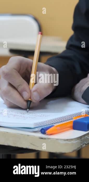Man Write Class, taking notes with colored pencils, writing in a ...