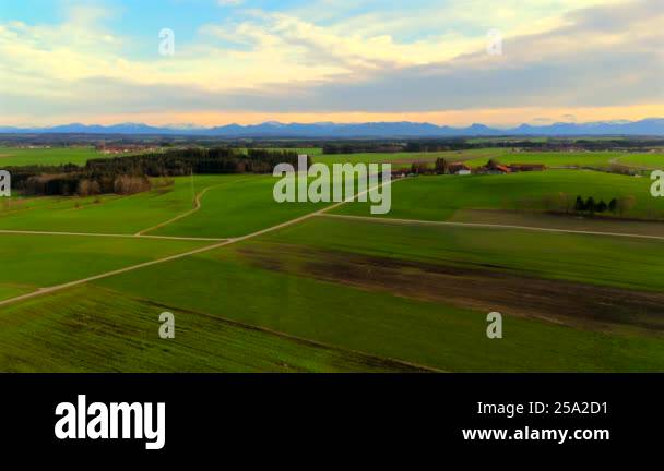 Aerial view of green fields in spring, Bavaria, Germany, showcasing ...