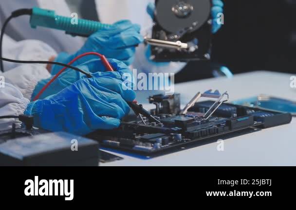 scientist in gloves and mask using microcircuit in laboratory Stock ...