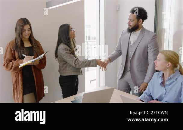 Diverse group of skilled professionals collaborates in a meeting ...