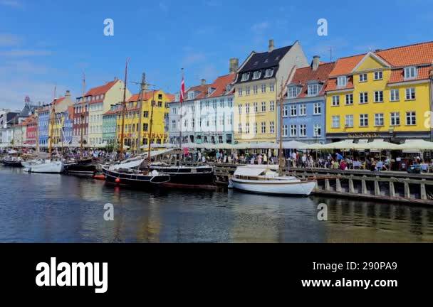 Copenhagen Denmark 20 July 2024, Brightly painted buildings line the ...