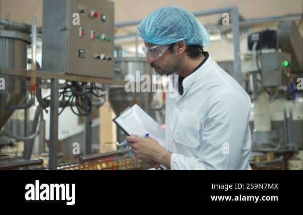 The production control supervisor inspects and controls the operation ...