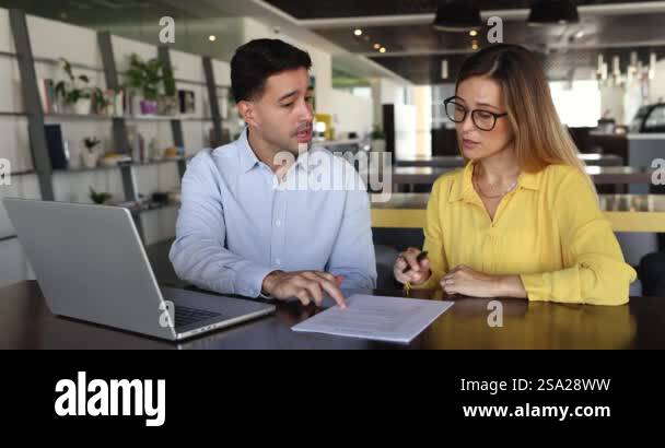 Client signs contract during formal and collaborative meeting in modern ...