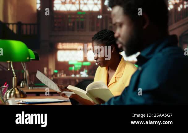 Diligent students reciting poetry together at the campus library ...