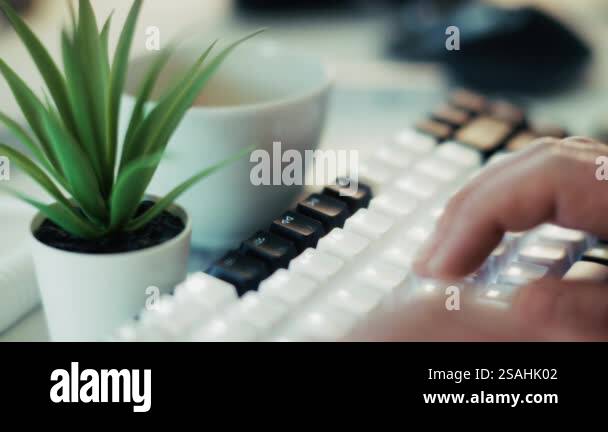hands typing on backlit mechanical keyboard journalist blogger software ...