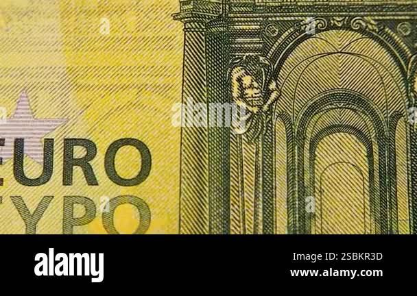 Close-up shot of a 100 euro banknote. Focuses on the architectural ...