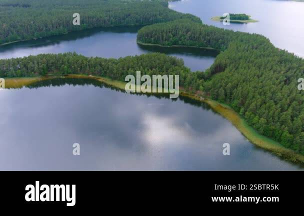 Scenic aerial rotating view of Sciuro Ragas peninsula, separating White ...