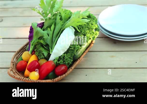 Rustic lunch setting featuring Biofarm vegetables radiating natural ...