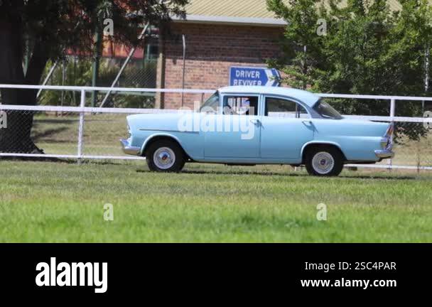 Classic car driving Stock Videos & Footage - HD and 4K Video Clips - Alamy