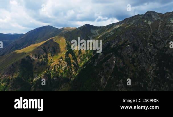 Sun Rays Shining Over Sharp Mountain Ridges Aerial Timelapse Beautiful ...