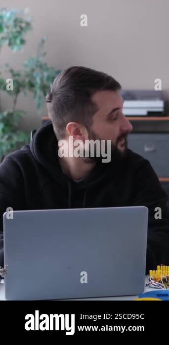 Curious Son And Positive Father Researching 3d Printer Together At Home
