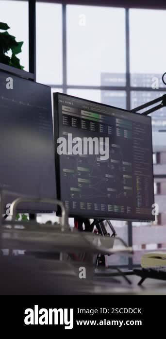 Vertical video Empty startup office with program running on PC ...