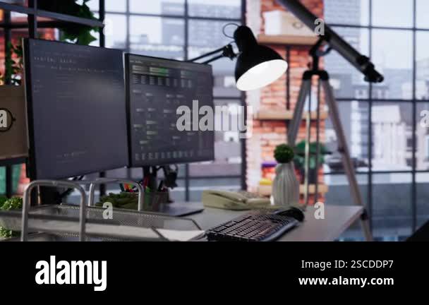 PC screens in innovative startup office showing programming languages ...