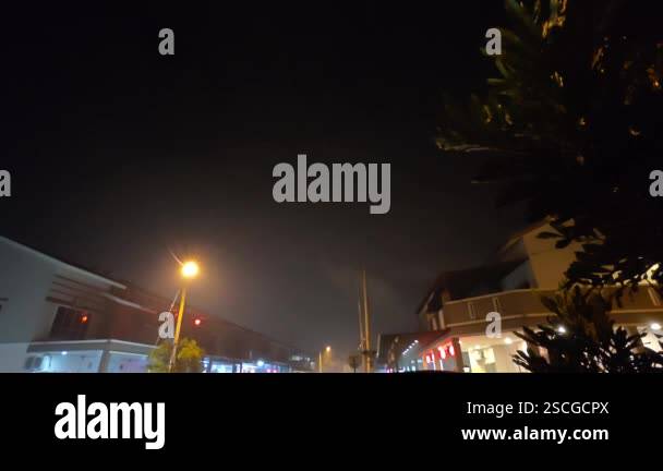 Time lapse outdoor night scene of Asian chinese people playing