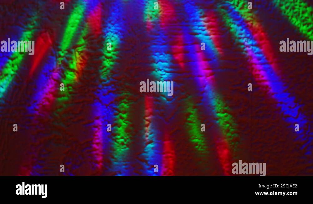bright multicolored rays illuminate the surface Stock Video Footage - Alamy