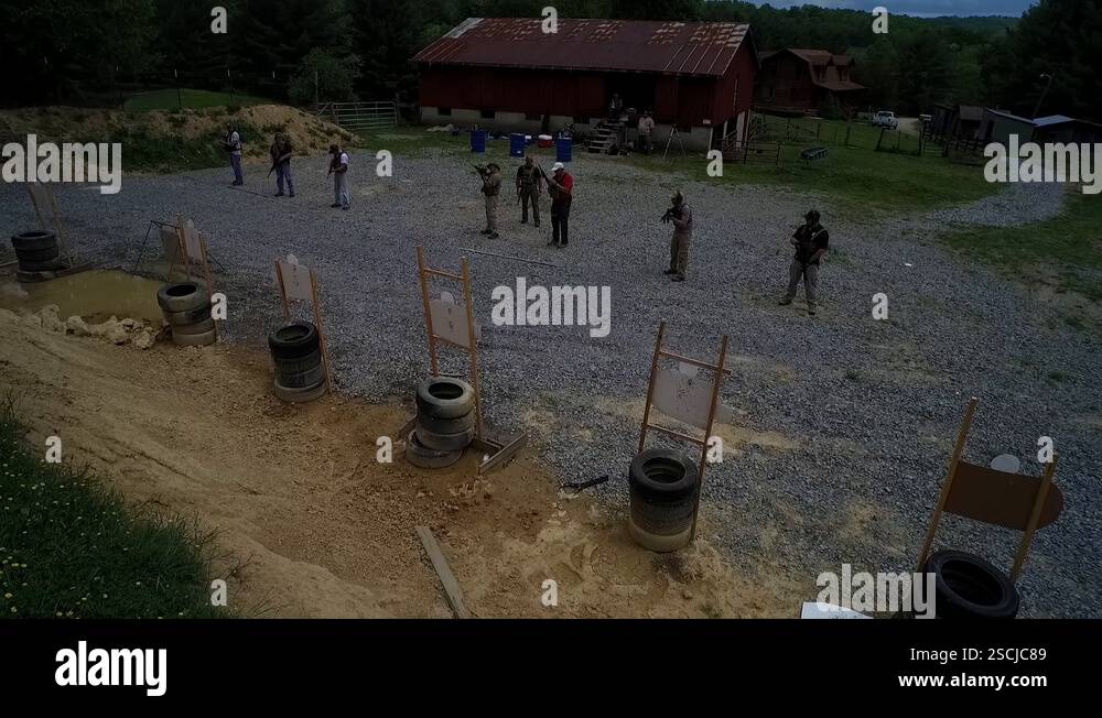 Triin Rang Group of men learning how to shoot in a training range Stock Video ...