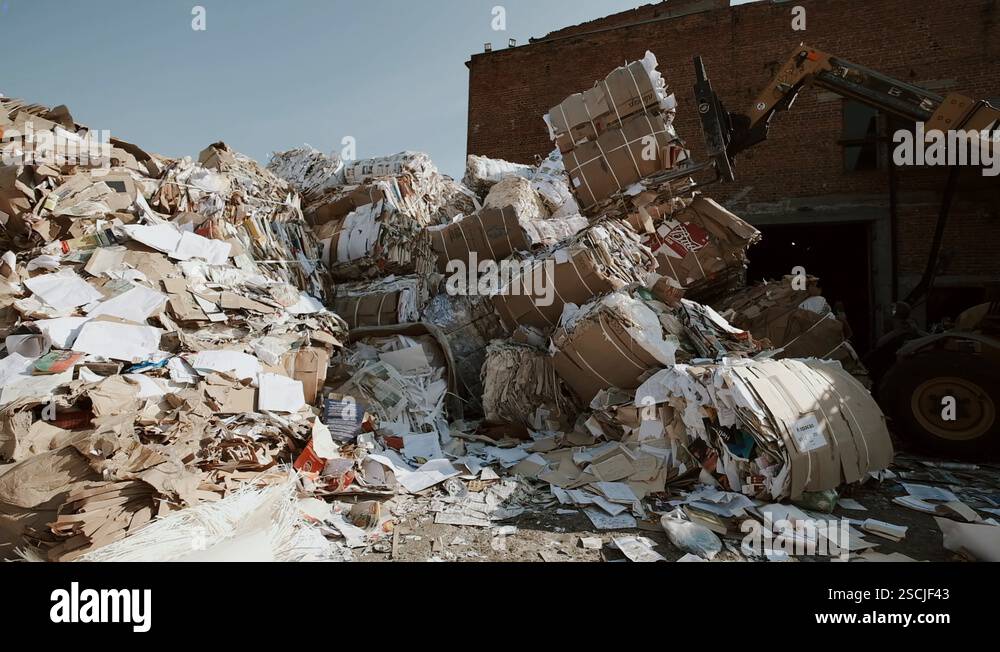 Forklift Working On A Paper Dump Stock Video Footage - Alamy